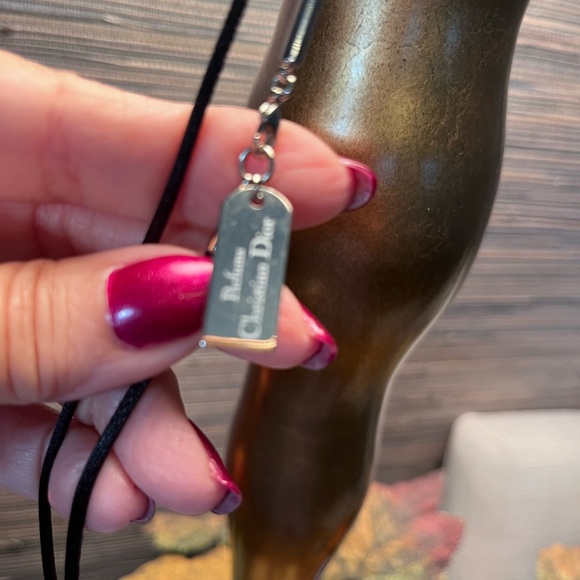 Dior Lip Gloss Mirror Ball Necklace on black satin necklace. - Picture 3 of 11